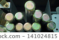 Zinc plated solid steel anchoring pins stored vertically in a bin 141024815