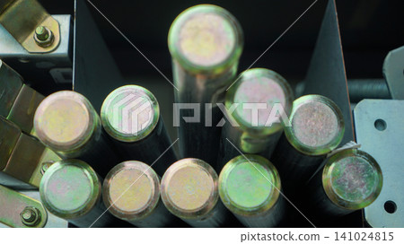 Zinc plated solid steel anchoring pins stored vertically in a bin Zinc plated solid steel anchoring pins stored vertically in a bin 141024815