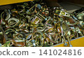 Zinc plated steel scaffolding clamps in a storage box 141024816