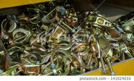 Zinc plated steel scaffolding clamps in a storage box Zinc plated steel scaffolding clamps in a storage box 141024816