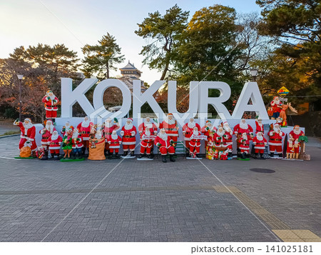Santa Claus standing side-by-side at Kokura Castle and the Christmas market in Kitakyushu City. Santa Claus standing side-by-side at Kokura Castle and the Christmas market in Kitakyushu City. 141025181
