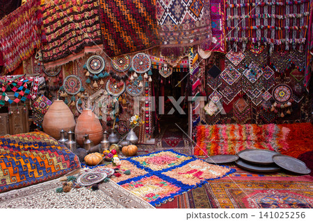 traditional turkish interior with many carpets on the wall traditional turkish interior with many carpets on the wall 141025256