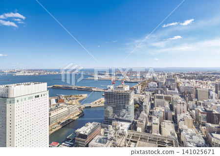 A panoramic view of the Yokohama Minato Mirai cityscape and Yokohama Port. A panoramic view of the Yokohama Minato Mirai cityscape and Yokohama Port. 141025671