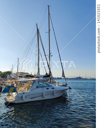 beautiful ships and boats are moored near the shore beautiful ships and boats are moored near the shore 141025851
