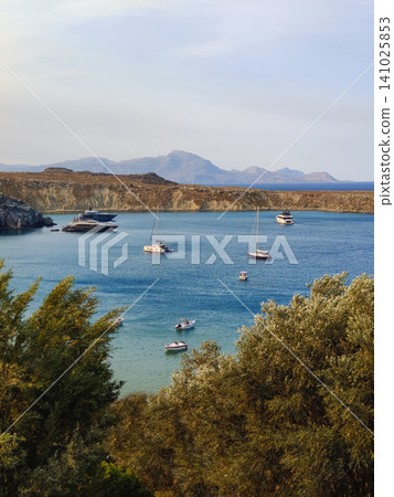 beautiful ships and boats are moored near the shore beautiful ships and boats are moored near the shore 141025853