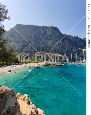 a beautiful ship is sailing in the blue sea jn Turkey Valley of Butterflies 141025863