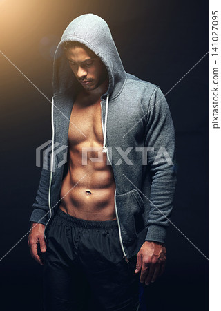 Fitness, hoodie and man with muscles on black background for exercise, training and intense workout. Sweat, sports and serious person with strength for performance, wellness and health in studio Fitness, hoodie and man with muscles on black background for exercise, training and intense workout. Sweat, sports and serious person with strength for performance, wellness and health in studio 141027095