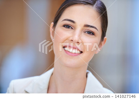 Business woman, portrait and smile for career, job and workplace confidence in human resources. Face of a young person, worker or employee in blurred background with closeup, integrity and values Business woman, portrait and smile for career, job and workplace confidence in human resources. Face of a young person, worker or employee in blurred background with closeup, integrity and values 141027146