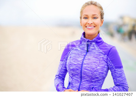 Woman, runner and ready in portrait by beach, exercise and training for marathon in sportswear. Female person, outdoors and fitness for healthy body, jog and cardio challenge for active workout Woman, runner and ready in portrait by beach, exercise and training for marathon in sportswear. Female person, outdoors and fitness for healthy body, jog and cardio challenge for active workout 141027407