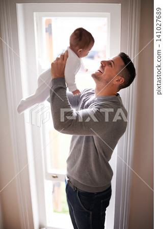 Father, baby in air and bonding, happy with love for growth and child development with joy at family home. Man, infant or newborn with smile and dad holding kid for comfort, childhood and parenting Father, baby in air and bonding, happy with love for growth and child development with joy at family home. Man, infant or newborn with smile and dad holding kid for comfort, childhood and parenting 141027689