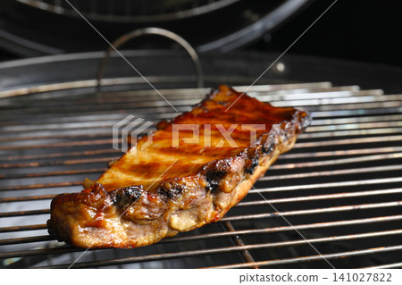 Delicious ribs on barbecue grill. Yummy meat 141027822