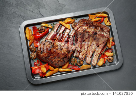 Delicious roasted ribs with garnish, top view 141027830