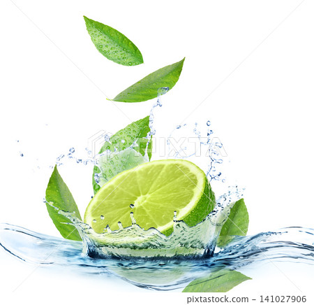 Ripe lime, fresh mint and splashing water on white background 141027906