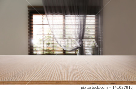 Empty wooden table in room. Space for design Empty wooden table in room. Space for design 141027913