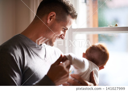 Father, baby and home with bonding, care and support together with family love at a window. Dad, smile and young child in a house with parent with newborn and man happy and proud about infant Father, baby and home with bonding, care and support together with family love at a window. Dad, smile and young child in a house with parent with newborn and man happy and proud about infant 141027999