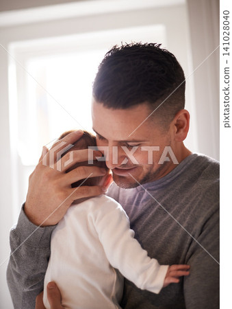 Dad, baby and pride with hug for bonding, love and happiness with child development and parenting. Peace, calm and childhood with smile, man and newborn infant for tender moment at family home Dad, baby and pride with hug for bonding, love and happiness with child development and parenting. Peace, calm and childhood with smile, man and newborn infant for tender moment at family home 141028040