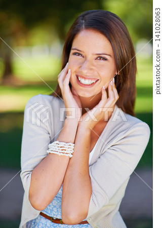 Happy woman, portrait and park for outdoor wellness, travel and fresh air in green environment. Face of a young and casual person with smile and excited facial expression for nature, garden or summer Happy woman, portrait and park for outdoor wellness, travel and fresh air in green environment. Face of a young and casual person with smile and excited facial expression for nature, garden or summer 141028063