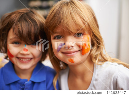 Happy children, portrait and face paint with color for artwork, craft or creativity at elementary school. Little girl, boy or kids with smile for colorful art, youth or early childhood development 141028447