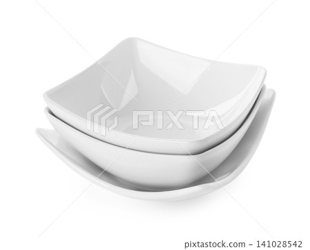 Stack of clean bowls isolated on white Stack of clean bowls isolated on white 141028542