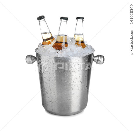 Beer in metal bucket with ice isolated on white Beer in metal bucket with ice isolated on white 141028549