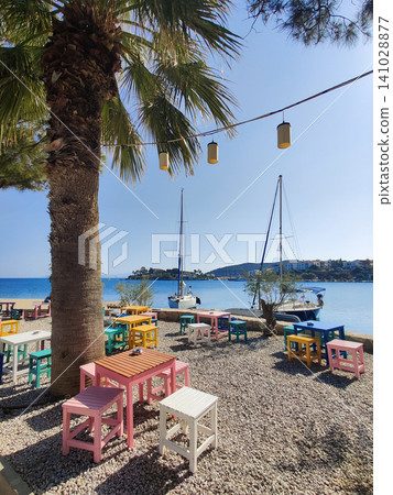 beautiful ships and boats are moored near the shore beautiful ships and boats are moored near the shore 141028877