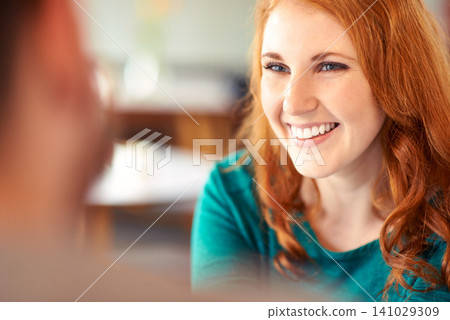 Couple, happiness and woman with smile in cafe, relax and together with man in date with joy. Adult, female person and girl with guy or partner in coffee shop for romance, anniversary and love 141029309