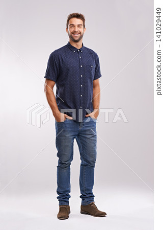 Casual, fashion and portrait of businessman in studio, background and mockup with confidence. Happy, man and relax in jeans with pride or creative person in business as art director or entrepreneur Casual, fashion and portrait of businessman in studio, background and mockup with confidence. Happy, man and relax in jeans with pride or creative person in business as art director or entrepreneur 141029449