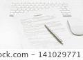 The pen for signing the contract on the keyboard, mouse. Selective focus 141029771