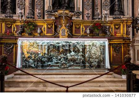 Naples, italy. December 27, 2024. Ornate baroque silver altar and reliquary with bas relief depicting scenes, part of the historical treasure of san gennaro in naples cathedral Naples, italy. December 27, 2024. Ornate baroque silver altar and reliquary with bas relief depicting scenes, part of the historical treasure of san gennaro in naples cathedral 141030877