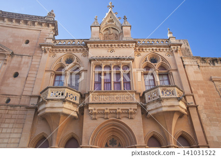 Ornate Neo-Gothic facade of Palazzo Santa Sofia in Mdina Malta Ornate Neo-Gothic facade of Palazzo Santa Sofia in Mdina Malta 141031522