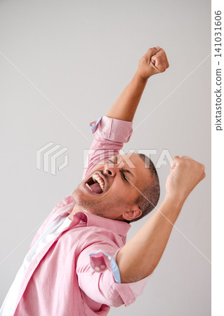 Ecstatic Mature Man Celebrating Success Ecstatic Mature Man Celebrating Success 141031606