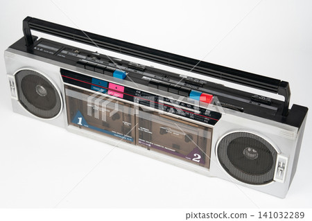 Vintage silver double cassette boombox isolated on white background Vintage silver double cassette boombox isolated on white background 141032289