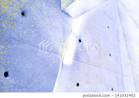 Light slits tinged with pale blue-purple and an architectural space of exposed concrete. Light slits tinged with pale blue-purple and an architectural space of exposed concrete. 141032402