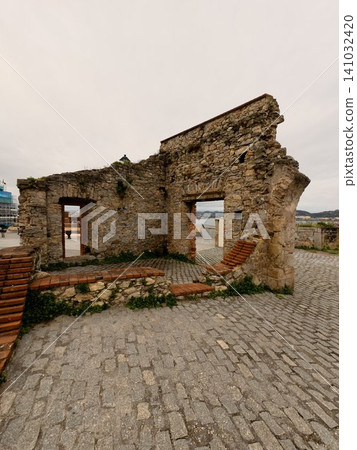 Ancient Stone Ruins on Coastal Waterfront, Historic Architecture Landmark in Northern Spain Ancient Stone Ruins on Coastal Waterfront, Historic Architecture Landmark in Northern Spain 141032420