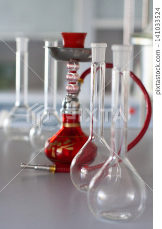 composition of red hookah and chemical glass flasks composition of red hookah and chemical glass flasks 141033524
