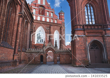 Stunning red brick architecture of St. Anne's Church and the Bernardine Monastery complex in Vilnius, Lithuania Stunning red brick architecture of St. Anne's Church and the Bernardine Monastery complex in Vilnius, Lithuania 141033525