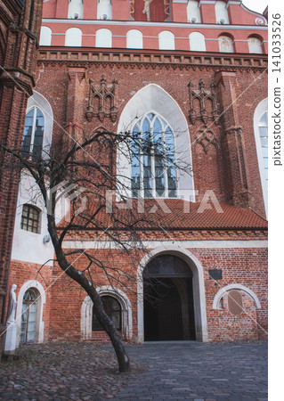 Stunning red brick architecture of St. Anne's Church and the Bernardine Monastery complex in Vilnius, Lithuania Stunning red brick architecture of St. Anne's Church and the Bernardine Monastery complex in Vilnius, Lithuania 141033526