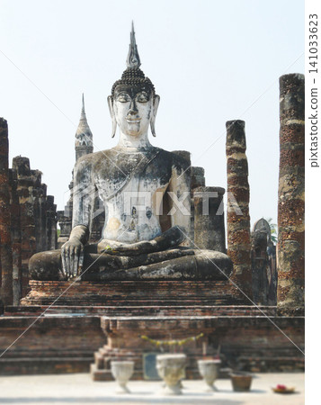 Seated Buddha statue at Wat Mahathat in Sukhothai Historical Park Thailand Seated Buddha statue at Wat Mahathat in Sukhothai Historical Park Thailand 141033623