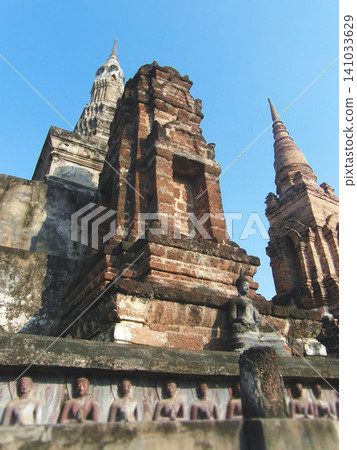 Ancient lotus bud chedi and ruins of Wat Mahathat in Sukhothai Thailand Ancient lotus bud chedi and ruins of Wat Mahathat in Sukhothai Thailand 141033629