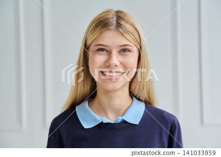Close up portrait of smiling teenage student girl Close up portrait of smiling teenage student girl 141033959
