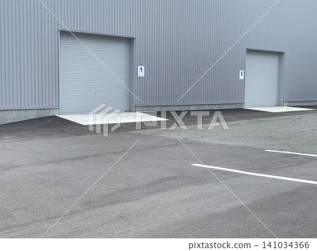 Loading shutters and exterior view of the warehouse at the logistics center. 141034366