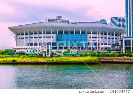 A view of Yokohama, Japan, including the K Arena and a passing JR Freight EF210 electric locomotive. A view of Yokohama, Japan, including the K Arena and a passing JR Freight EF210 electric locomotive. 141034777