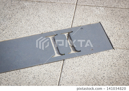 Roman numerical number two made of stone tiles on street Roman numerical number two made of stone tiles on street 141034820