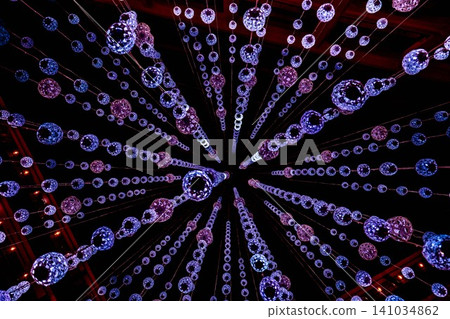 A purple sphere floating in a pitch-black space, an elegant illumination art. A purple sphere floating in a pitch-black space, an elegant illumination art. 141034862