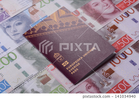 Sweden, swedish passport or id document with tickets for flight, travel. Swedish passport Sweden, swedish passport or id document with tickets for flight, travel. Swedish passport 141034940