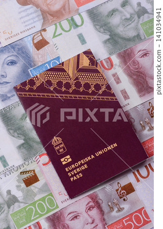 Sweden, swedish passport or id document with tickets for flight, travel. Swedish passport Sweden, swedish passport or id document with tickets for flight, travel. Swedish passport 141034941