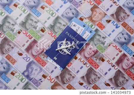 Sweden, swedish passport or id document with tickets for flight, travel. Swedish passport Sweden, swedish passport or id document with tickets for flight, travel. Swedish passport 141034973
