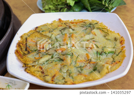 Crispy Pan Fried Traditional Korean Potato Pancake Gamjajeon Crispy Pan Fried Traditional Korean Potato Pancake Gamjajeon 141035297