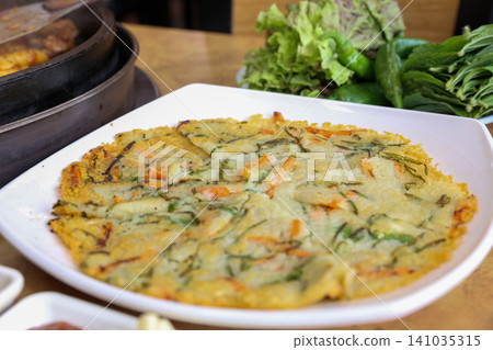 Crispy Pan Fried Traditional Korean Potato Pancake Gamjajeon Crispy Pan Fried Traditional Korean Potato Pancake Gamjajeon 141035315