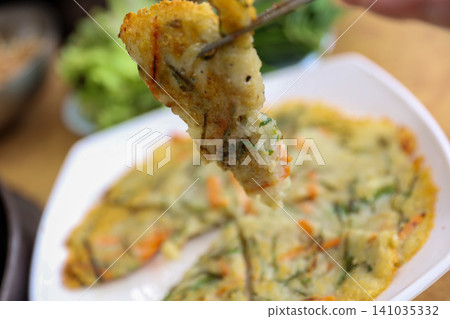 Crispy Pan Fried Traditional Korean Potato Pancake Gamjajeon 141035332